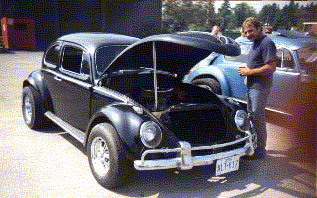 Big Joe scopes out the Maddman's V8 bug